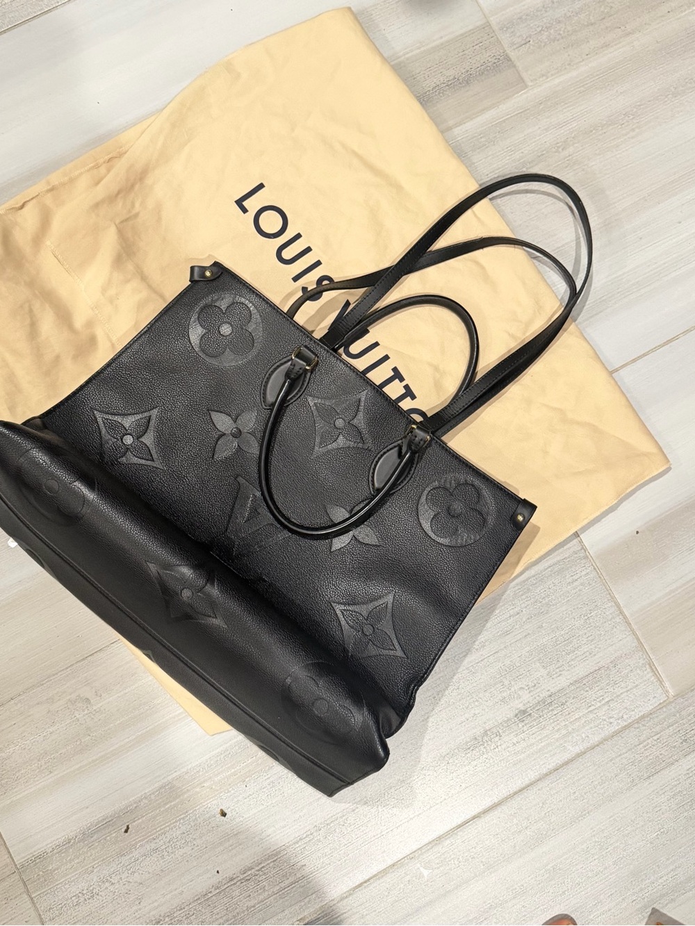 Louis Vuitton Black Monogram-Embossed Leather Tote Bag